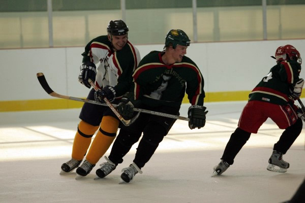 Thomas Huling and Seawolf Ryan McMullen keep it friendly.